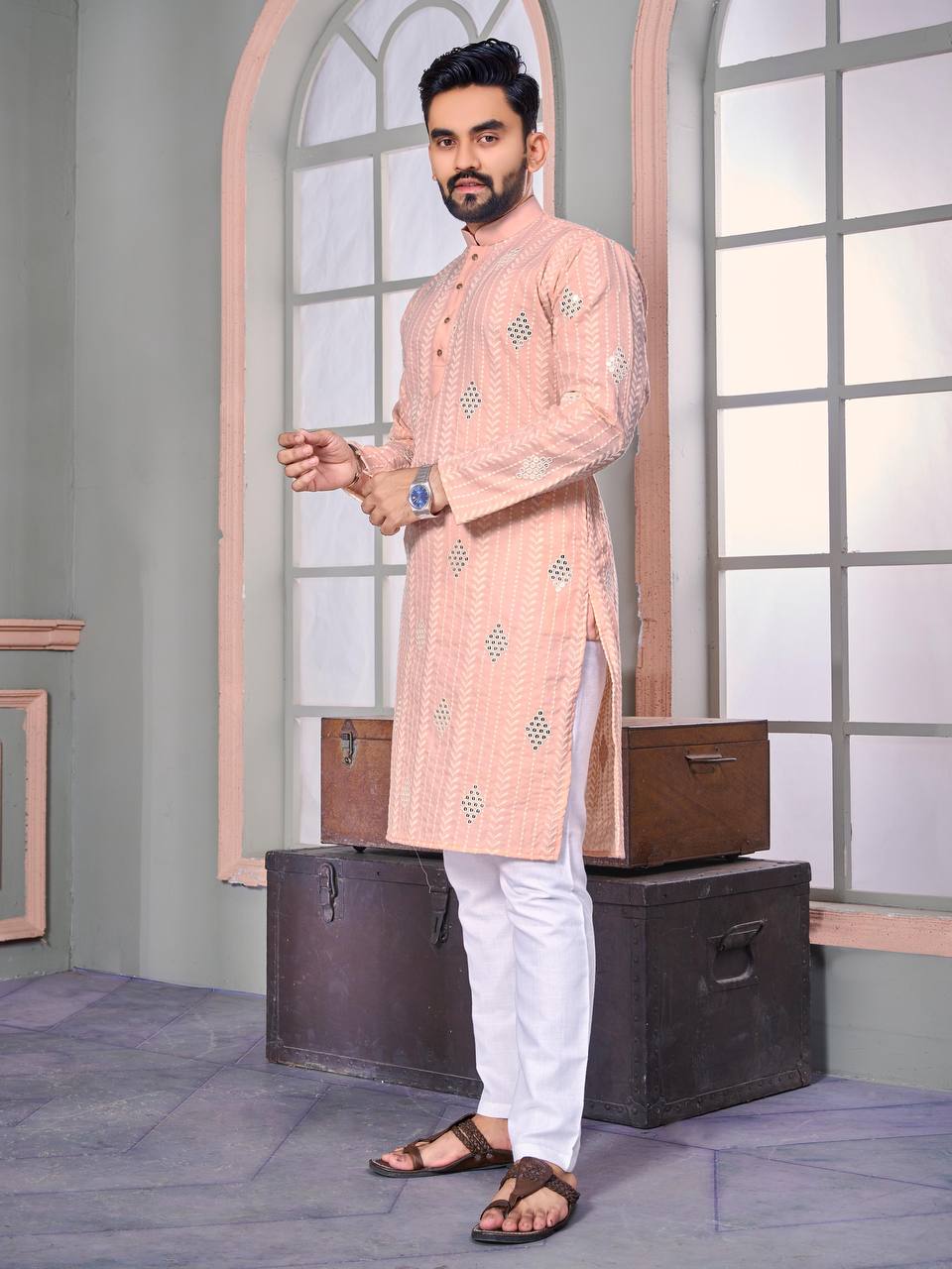 The Classic Peach Sequence Embroidery Kurta with pajama.